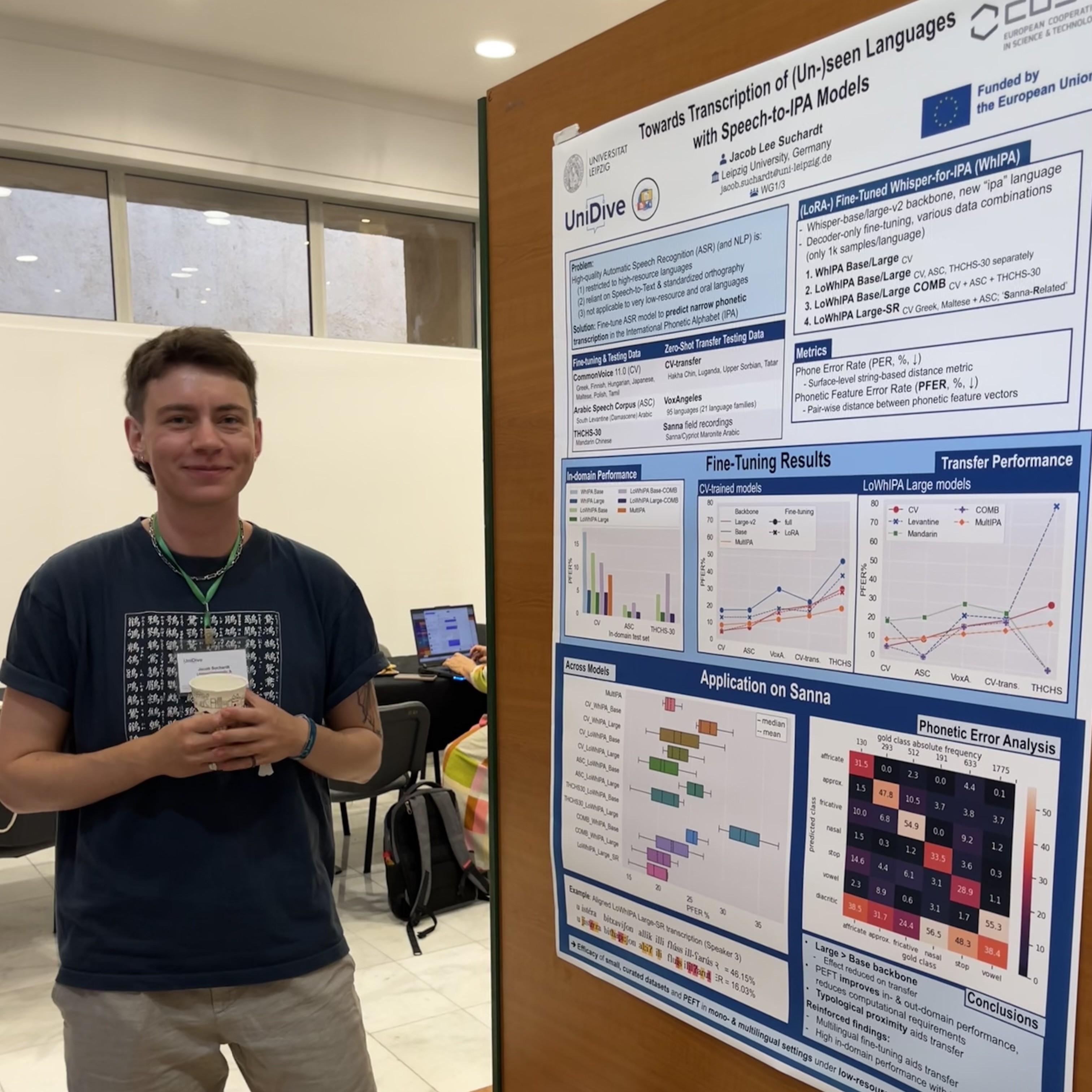 Jacob Lee Suchardt beside his poster at the 4th UniDive General Meeting